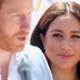 Meghan, Duchess of Sussex looks on as Prince Harry, Duke of Sussex speaks during a visit on October 02, 2019 in Johannesburg, South Africa.